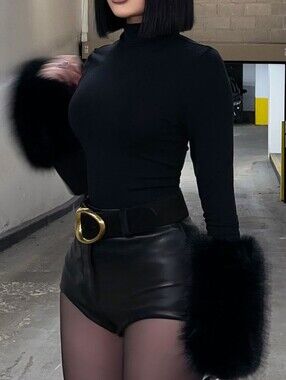 Black bodysuit with long sleeves and voluminous faux fur on the cuffs
